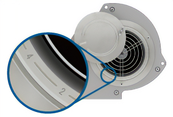 The damper's body is marked with a scale