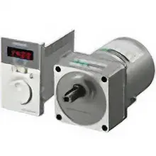 Drive system with white controller with digital display on the left and motor with silver gearhead on the right